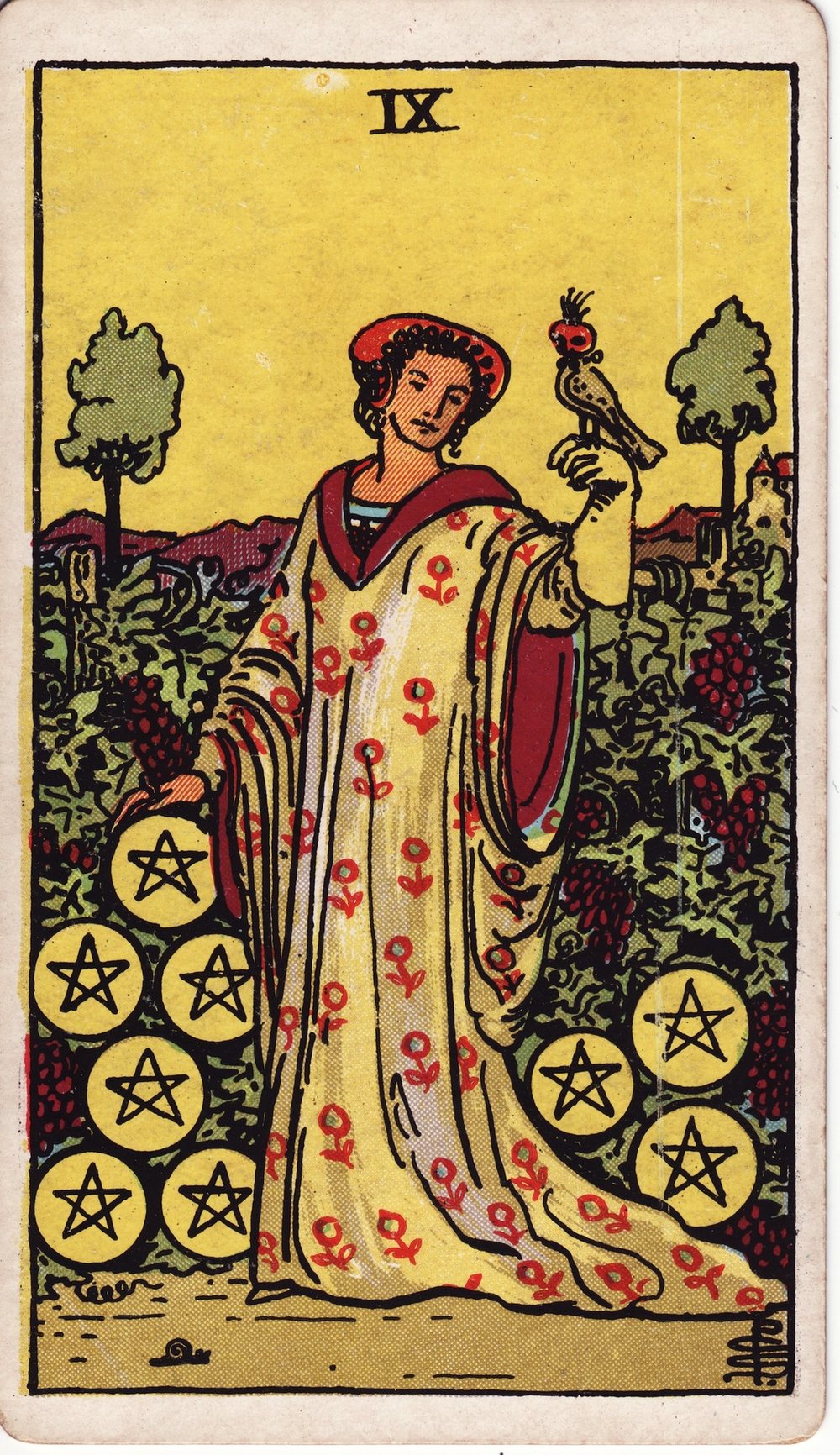 The Nine of Pentacles card in the Rider-Waite-Smith tarot deck